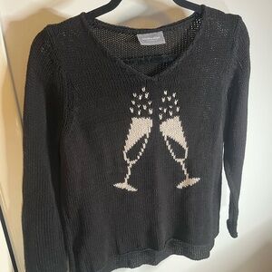 Wooden Ships Black V-Neck Sweater with Champagne Glasses